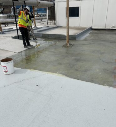 Worker installing a building roof