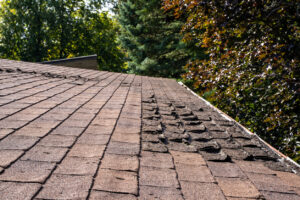 damaged shingles requiring commercial roof repair