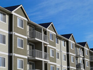 multifamily apartment building asphalt shingle roofing system
